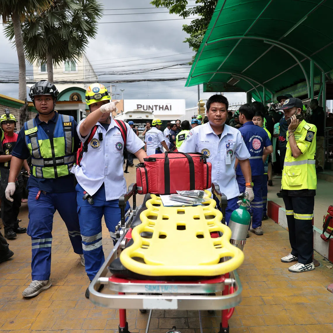 Emergency personnel working at the Debsirin Nonthaburi School in Thailand’s Nonthaburi province, the site of a shooting incident on Aug 7.