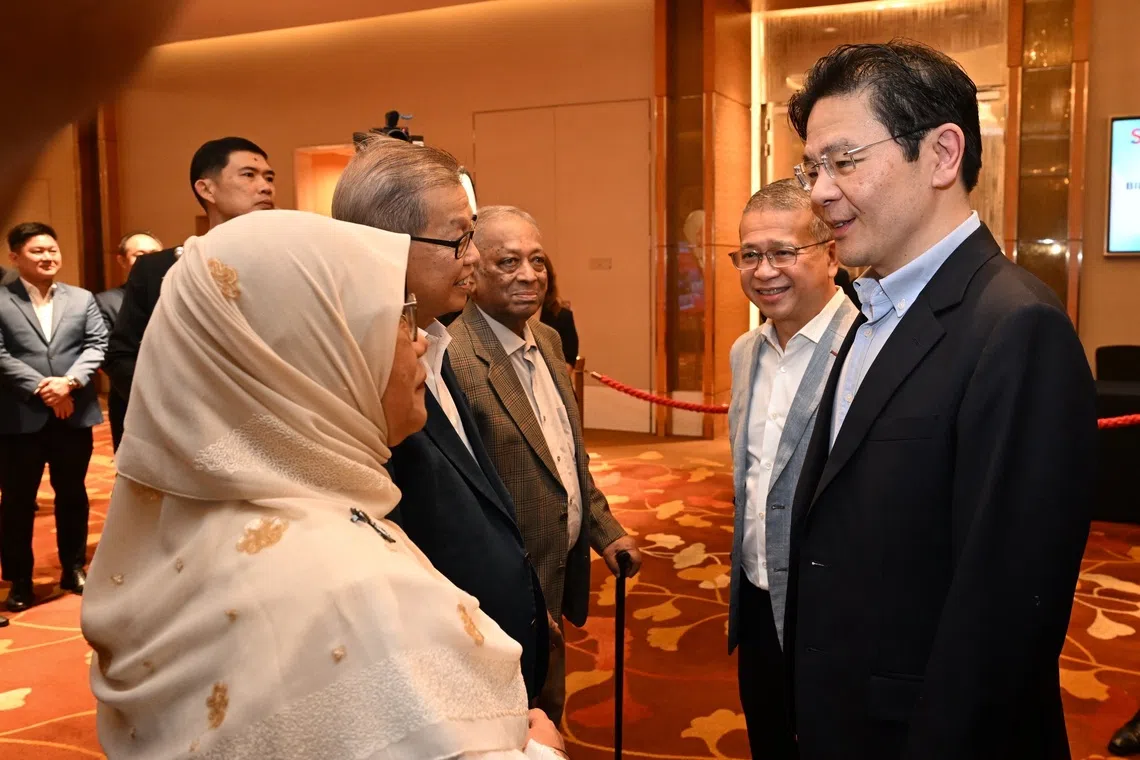 (From right) PM Lawrence Wong and Law Minister Edwin Tong speaking to attendees at a dinner on Oct 23 to mark the 60th anniversary of PA’s Citizens’ Consultative Committees.