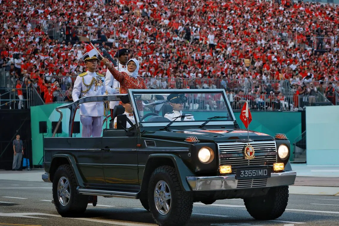 President Halimah Yacob arrived at the Padang at about 6.50pm, to applause and cheers from the gathered spectators.
