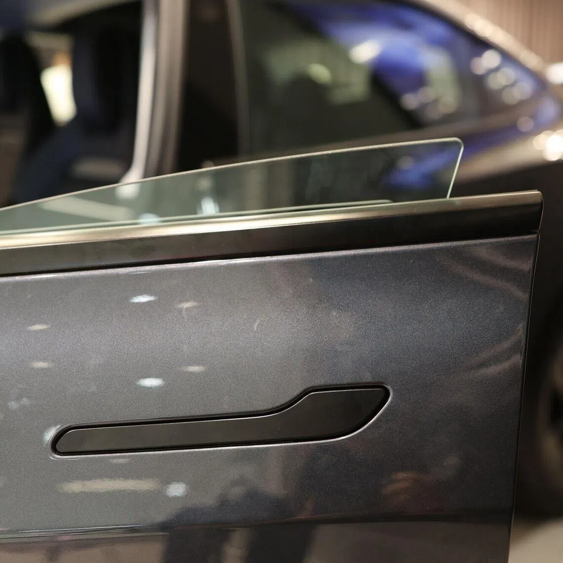The vehicle recall remedies range from software updates to warning labels and improved markings around door handles.
