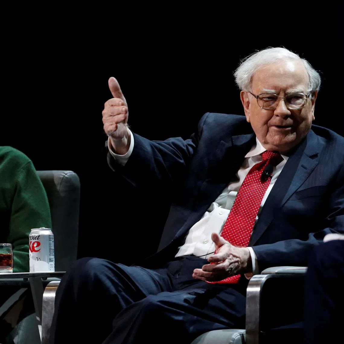 FILE PHOTO: Warren Buffett, chairman and CEO of Berkshire Hathaway, speaks while Bill Gates looks on at Columbia University in New York, U.S., January 27, 2017. REUTERS/Shannon Stapleton/File Photo
