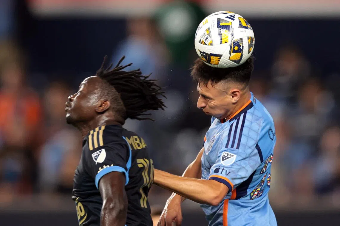 Sep 18, 2024; New York, New York, USA; New York City FC forward Agustin Ojeda (26) battles for a header against Philadelphia Union defender Olivier Mbaizo (15) during the first half at Yankee Stadium. Mandatory Credit: Vincent Carchietta-Imagn Images/ File Photo