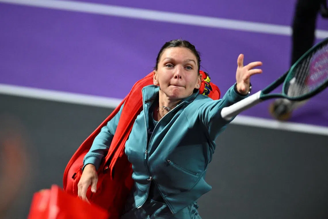 Simona Halep throws her racket to fans at the end of a match during Transylvania Open in Cluj-Napoca, Romania, February 4, 2024. Inquam Photos/Alex Nicodim via REUTERS
