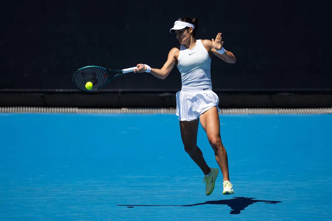 Jan 14, 2025; Melbourne, Victoria, Australia; Emma Raducanu of United Kingdom hits a forehand during her match against Ekaterina Alexandrova in the first round of the women's singles at the 2025 Australian Open at Melbourne Park. Mandatory Credit: Mike Frey-Imagn Images
