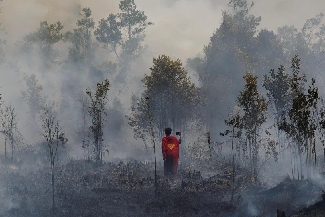 Rudiyansah said that he wet his costume slightly before heading into the fields to prevent it from burning.