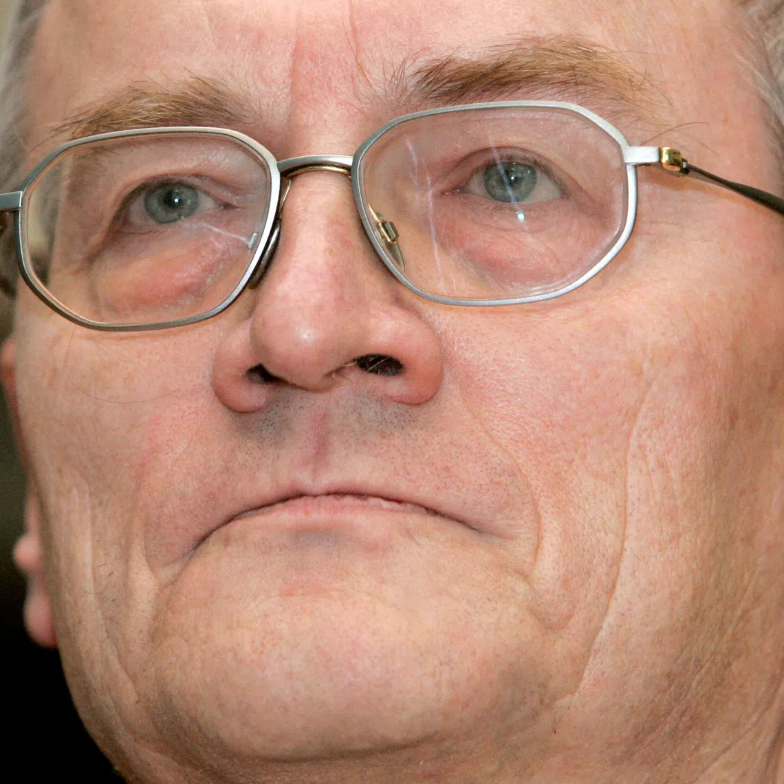FILE PHOTO: August Hanning, state secretary at the German Interior Ministry and former head of Germany's Federal Intelligence Service (BND), attends a parliamentary committee of investigation in Berlin, Germany, November 30, 2006. REUTERS/Fabrizio Bensch/File Photo