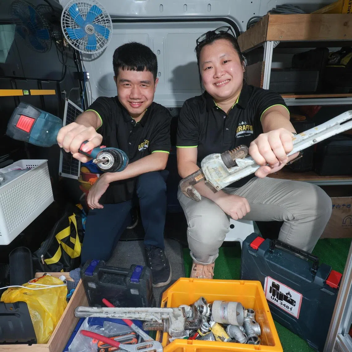 Plumbers Geraldine Goh and Yeo Kai Xun prefer hands-on, problem-solving roles.