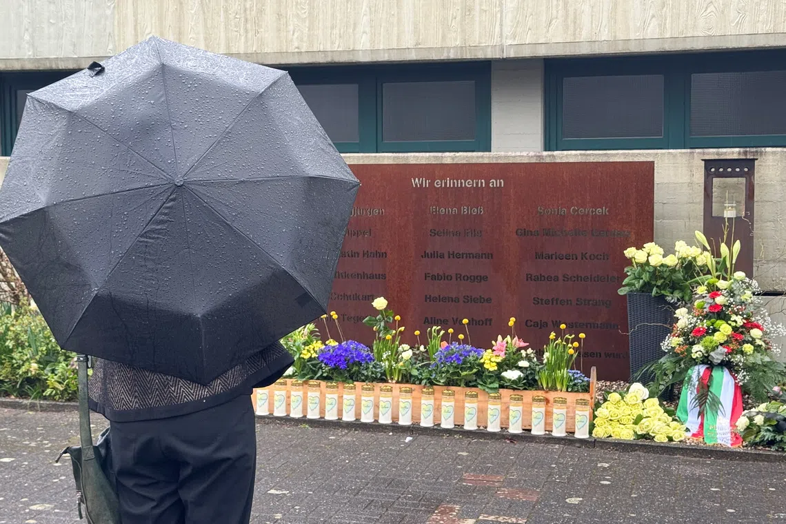 Sylvia Loehrmann, former school and culture minister of the federal state of North Rhine-Westphalia, pays respect to the victims of the Germanwings 4U9525 plane crash, at the Joseph-Koenig Gymnasium during the 10th anniversary of the crash in Haltern am See, Germany, March 24, 2025. REUTERS/Stephan Nitschke