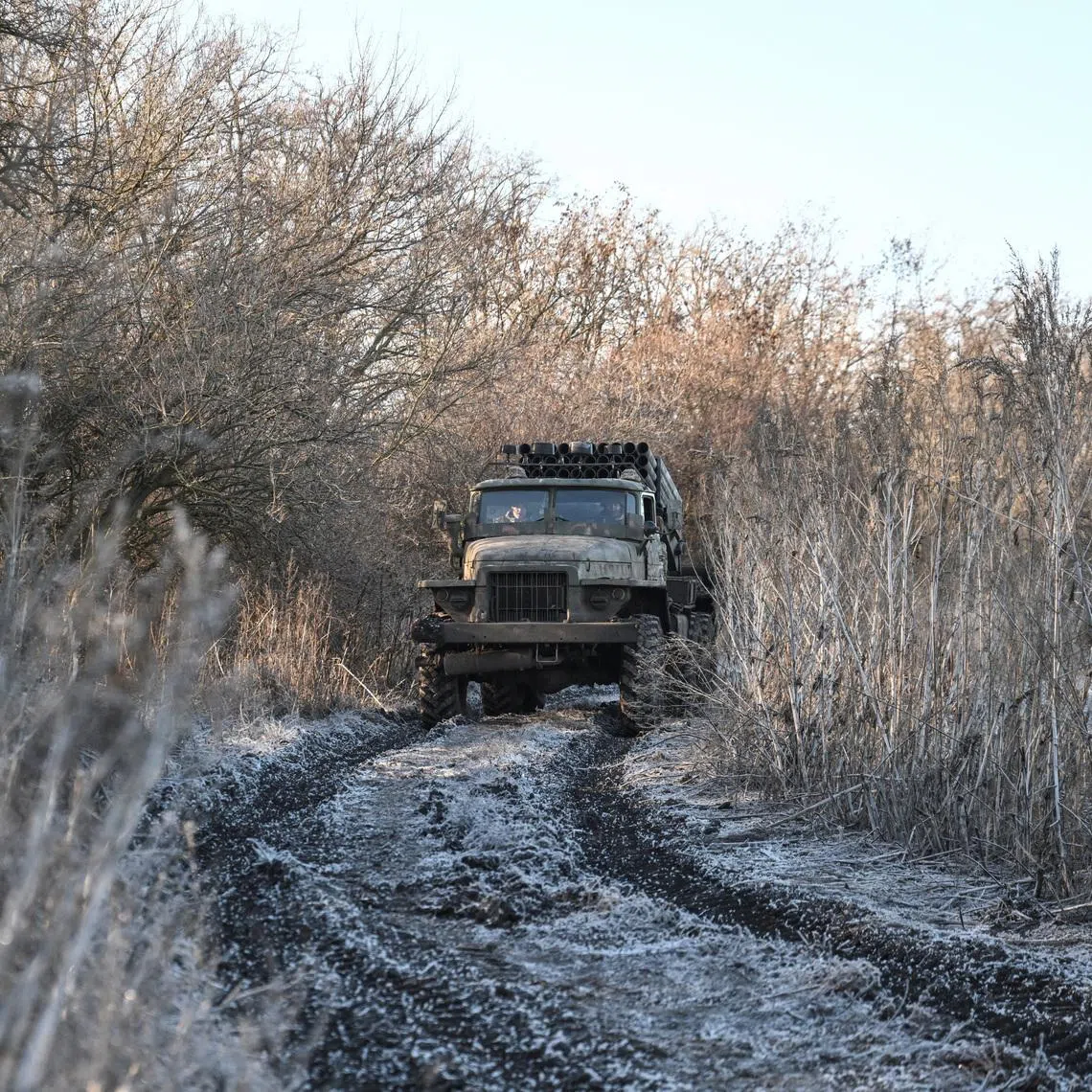 Service members of the 152nd Jaeger Brigade of the Ukrainian Armed Forces drive a BM-21 Grad multiple rocket launch system in a front line, amid Russia's attack on Ukraine, in Donetsk region, Ukraine December 25, 2025. REUTERS/Stringer