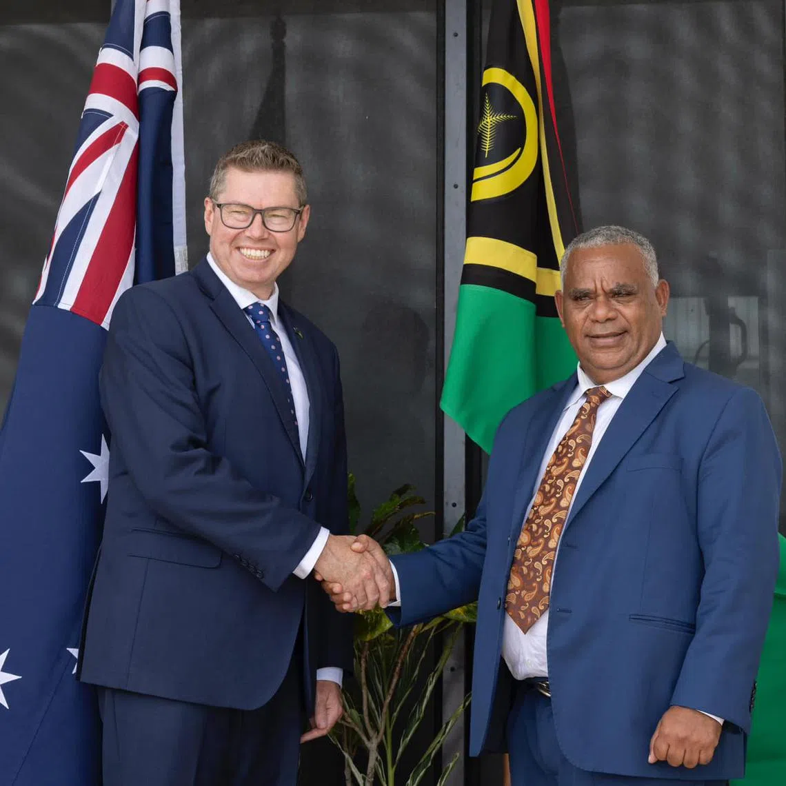 Mr Conroy (left) held talks with Vanuatu Prime Minister Jotham Napat and pledged to remain another US$3.2 million (S$4.29 million) in direct budget support for Vanuatu. 