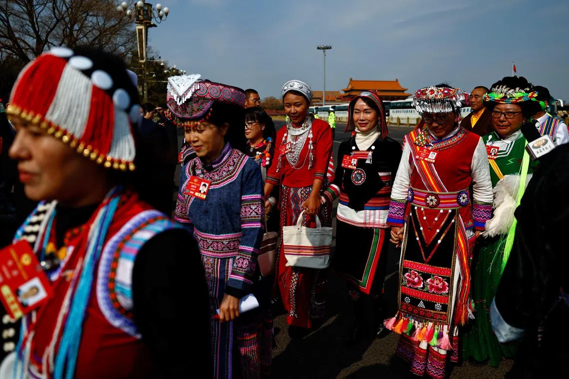 Delegates arriving for the opening session of the Chinese People's Political Consultative Conference in Beijing on March 4.
