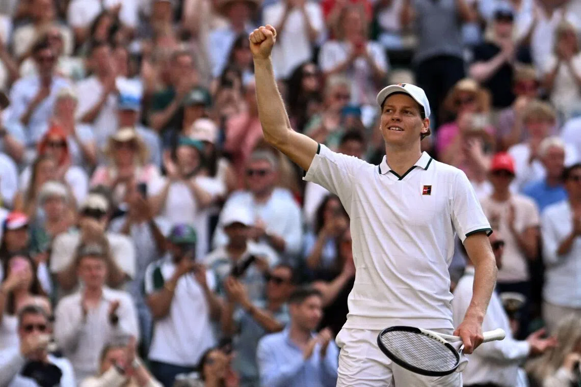 Italy's Jannik Sinner celebrates beating Serbia's Novak Djokovic during their men's singles semi-final tennis match on the twelfth day of the 2026 Wimbledon Championships at The All England Lawn Tennis and Croquet Club in Wimbledon, southwest London, on July 10, 2026. (Photo by Kirill KUDRYAVTSEV / AFP) / RESTRICTED TO EDITORIAL USE