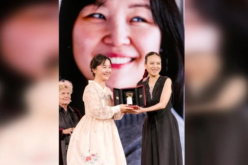 The first woman president of Thailand's football association Nualphan Lamsam (right) with first place winner of East Asia, Jeklin Kim (left), at the 2026 Cartier Women’s Initiative awards ceremony.