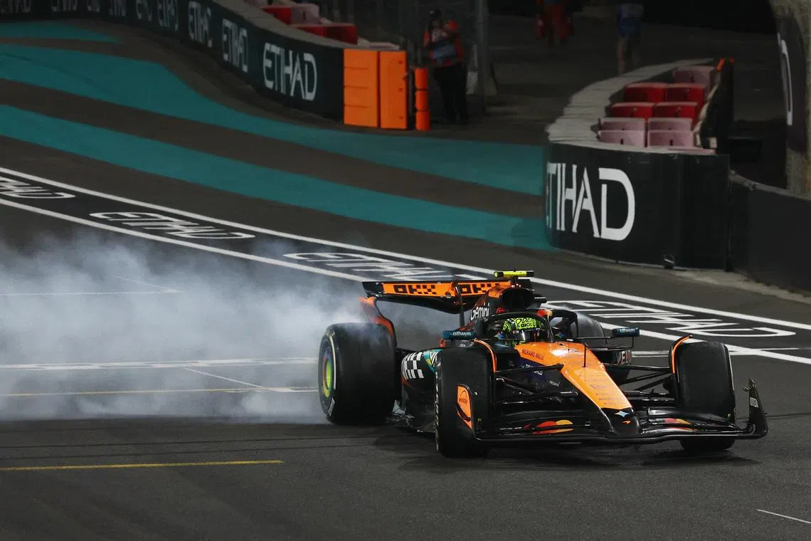 Formula One F1 - Abu Dhabi Grand Prix - Yas Marina Circuit, Abu Dhabi, United Arab Emirates - December 7, 2025 McLaren's Lando Norris celebrates after becoming the 2025 Formula One World Champion REUTERS/Jakub Porzycki