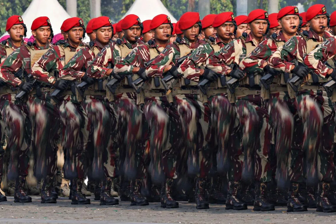 FILE PHOTO: Indonesian Military Special Forces personnel march during the 79th Indonesian Military Anniversary celebrations at the National Monument (Monas) complex in Jakarta, Indonesia, October 5, 2024. REUTERS/Ajeng Dinar Ulfiana/File Photo