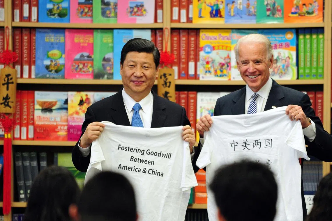 Then US Vice President Joe Biden and his Chinese counterpart Xi Jinping outside Los Angeles on Feb 17, 2012..