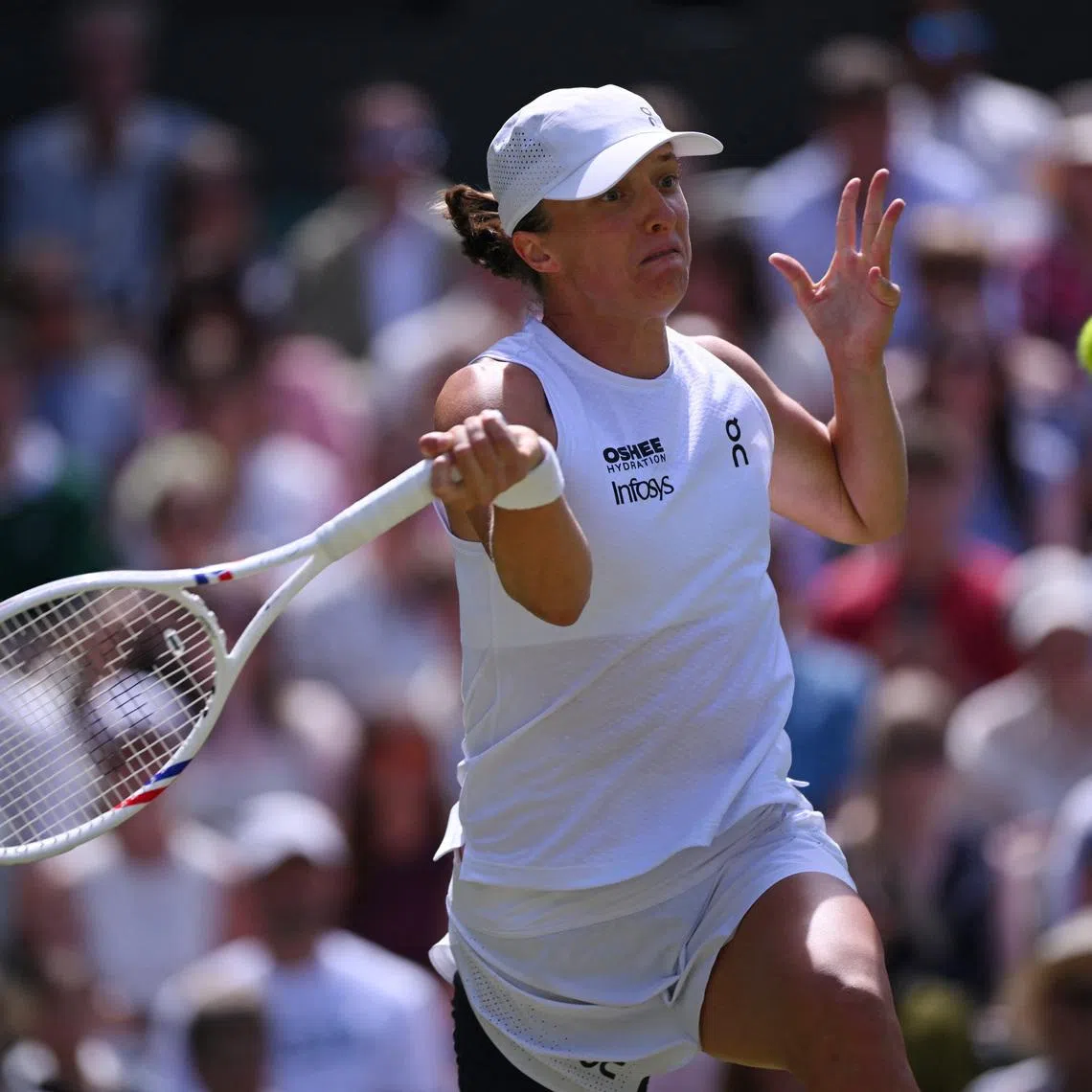 Tennis - Wimbledon - All England Lawn Tennis and Croquet Club, London, Britain - July 2, 2026 Poland's Iga Swiatek in action during her second round match against Czech Republic's Karolina Pliskova REUTERS/Jaimi Joy