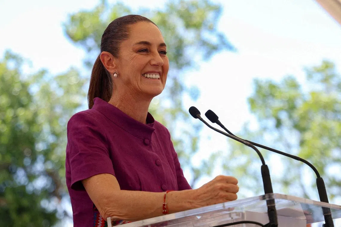 Mexico's President Claudia Sheinbaum smiles during an event in Leon, Guanajuato state, Mexico March 1, 2025. Presidencia de Mexico/Handout via REUTERS