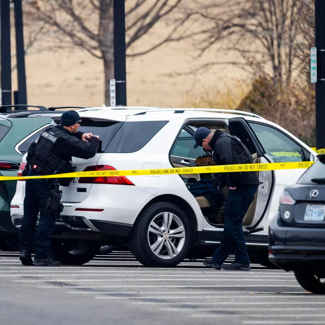 US Capitol police searching a vehicle on Feb 17 in the vicinity of the Capitol in Washington DC, after a young man running towards the building with a shotgun was arrested.