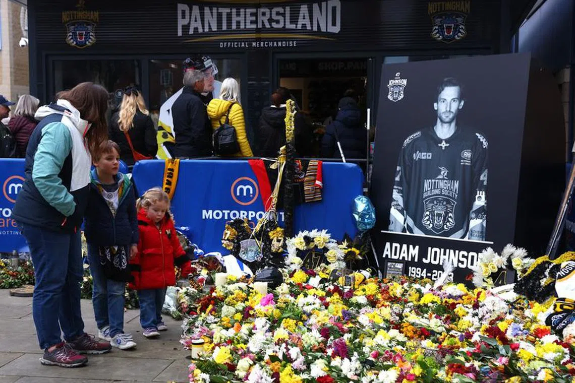 Ice Hockey - Elite Ice Hockey League - Nottingham Panthers v Belfast Giants - National Ice Centre, Nottingham, Britain - November 26, 2023 A tribute to Nottingham Panthers' Adam Johnson is pictured outside the stadium before the match REUTERS/Matthew Childs/File photo