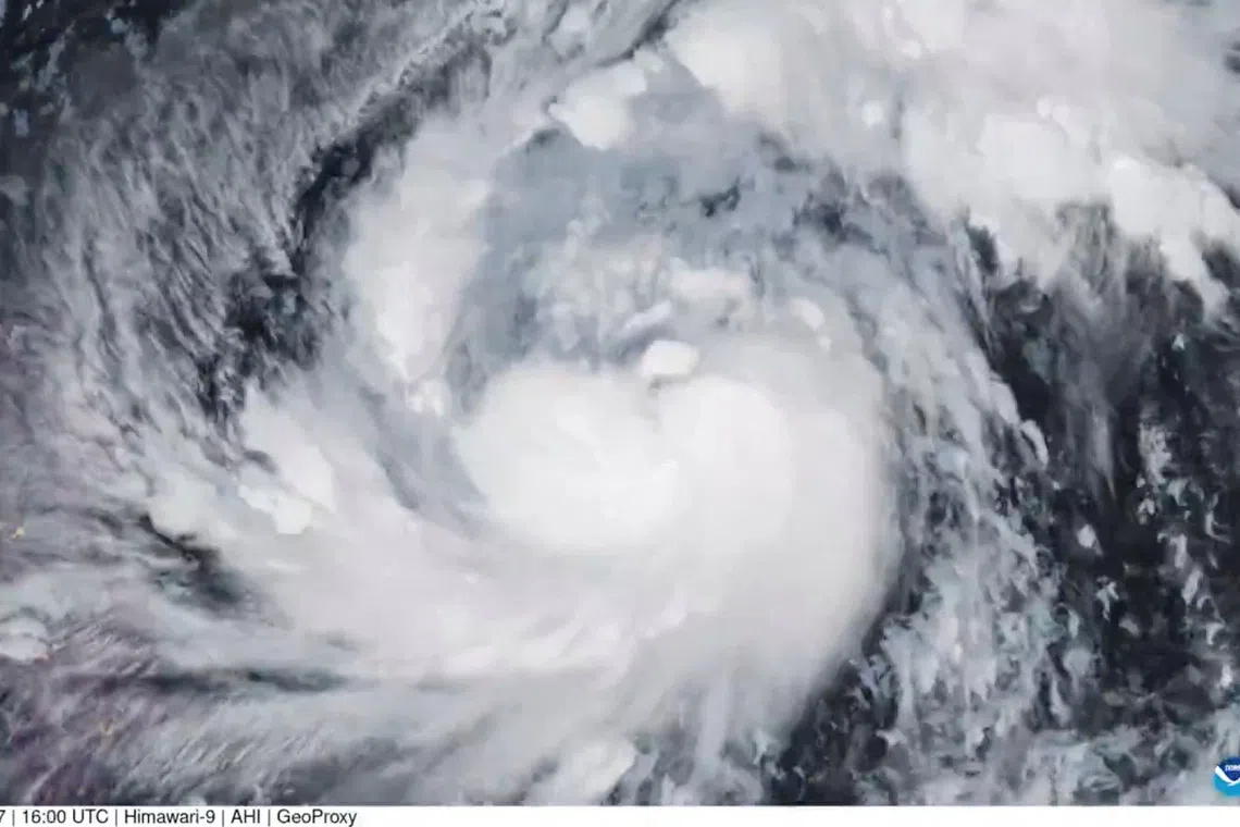 A satellite image shows Storm Fung-Wong, which has intensified into a typhoon, over the Philippine Sea on Nov 7.