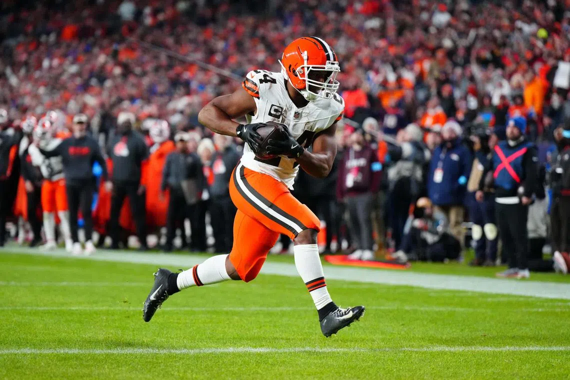 FILE PHOTO: Dec 2, 2024; Denver, Colorado, USA; Cleveland Browns running back Nick Chubb (24) scores a touchdown in the fourth quarter against the Denver Broncos at Empower Field at Mile High. Mandatory Credit: Ron Chenoy-Imagn Images/ File Photo