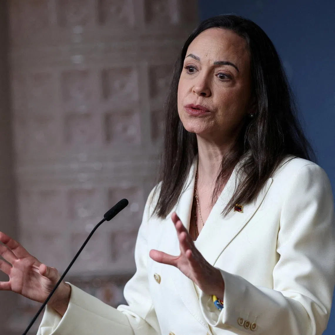 FILE PHOTO: Nobel Peace Prize laureate and Venezuelan opposition leader Maria Corina Machado speaks during a press conference in Oslo, Norway December 11, 2025. REUTERS/Leonhard Foeger/File Photo