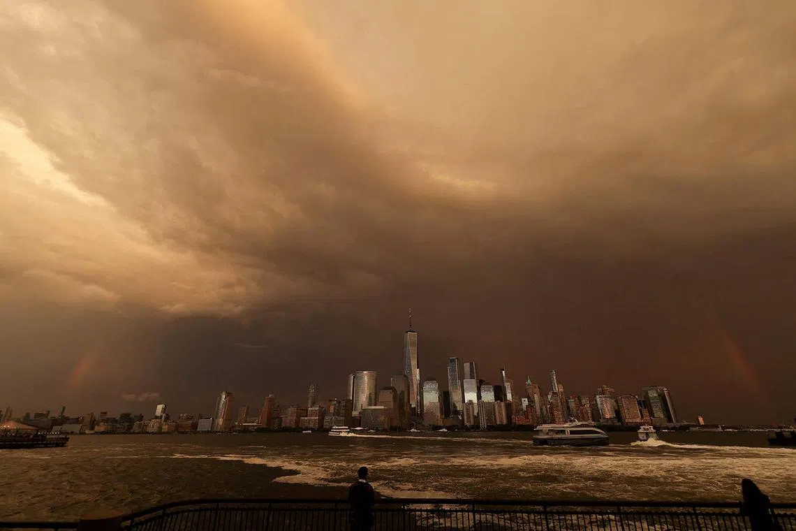 A rainbow is seen over the One World Trade Center on the day of the 22nd anniversary of the Sept 11, 2001 attacks, viewed from Jersey City, New Jersey, US, on Sept 11.