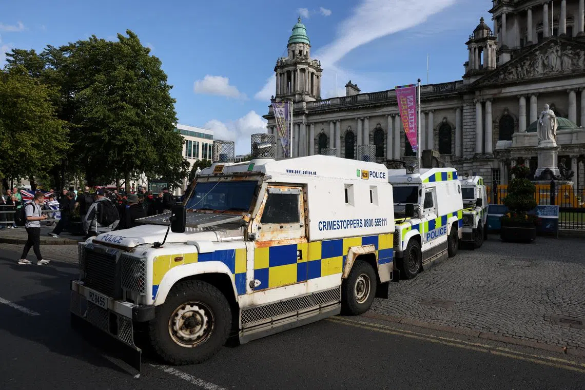 Police Service of Northern Ireland (PSNI) armoured vehicles are seen during an anti-racism and anti-immigration protest in Belfast, Northern Ireland, August 9, 2024. REUTERS/Hollie Adams