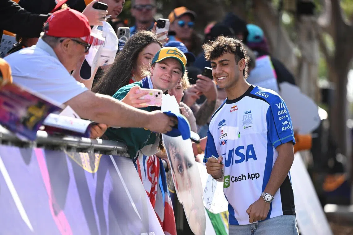 Arvid Lindblad of Racing Bulls greetings fans at the Australian Grand Prix on March 8. The Briton hit F1 like a meteor as he scooped eighth place in a car running short of boost by the end.