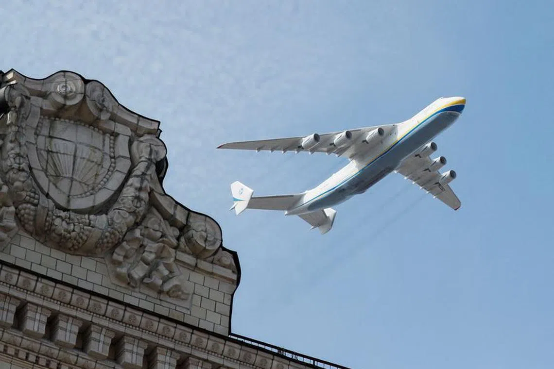 FILE PHOTO: Ukrainian Antonov An-225 Mriya cargo plane, the world's biggest aircraft, flies during the Independence Day military parade in Kyiv, Ukraine August 24, 2021.  REUTERS/Gleb Garanich/File Photo