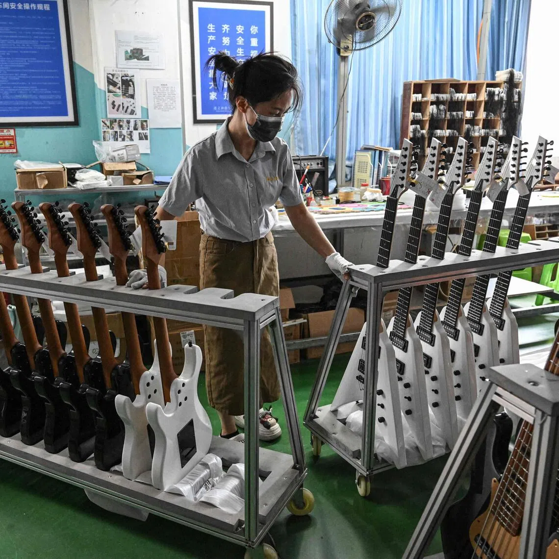 Zheng’an as a whole manufactures 2.5 million guitars a year.