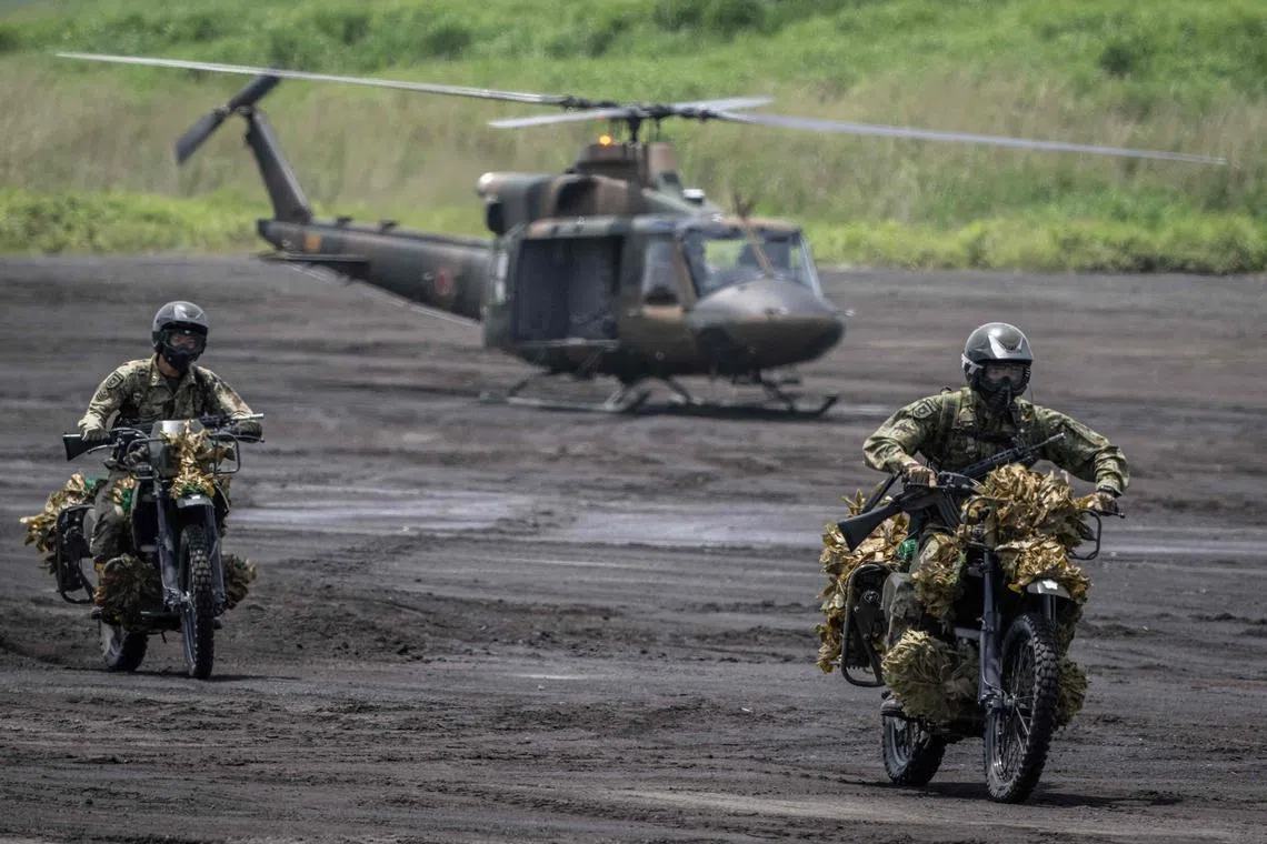 Members of the Japan Ground Self-Defence Force take part in a live fire exercise at East Fuji Manoeuvre Area in Gotemba on May 27, 2023.