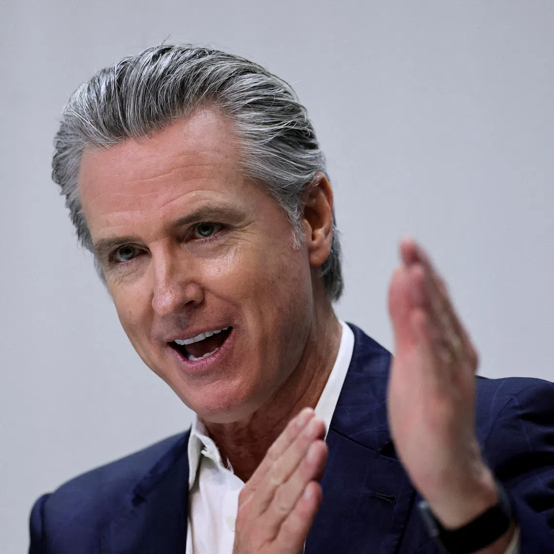 FILE PHOTO: California Governor Gavin Newsom gestures as he attends a press conference, during the UN Climate Change Conference (COP30), in Belem, Brazil, November 11, 2025. REUTERS/Adriano Machado/File Photo
