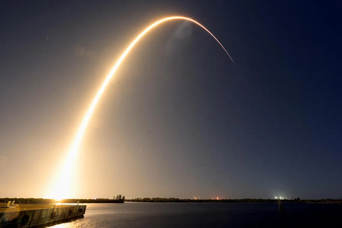 FILE PHOTO: A SpaceX Falcon 9 rocket launches carrying Firefly Aerospace's Blue Ghost lunar lander as the primary payload and Japan-based ispace's Resilience lander as a secondary payload, from Kennedy Space Center in Cape Canaveral, Florida, U.S., January 15, 2025. REUTERS/Steve Nesius