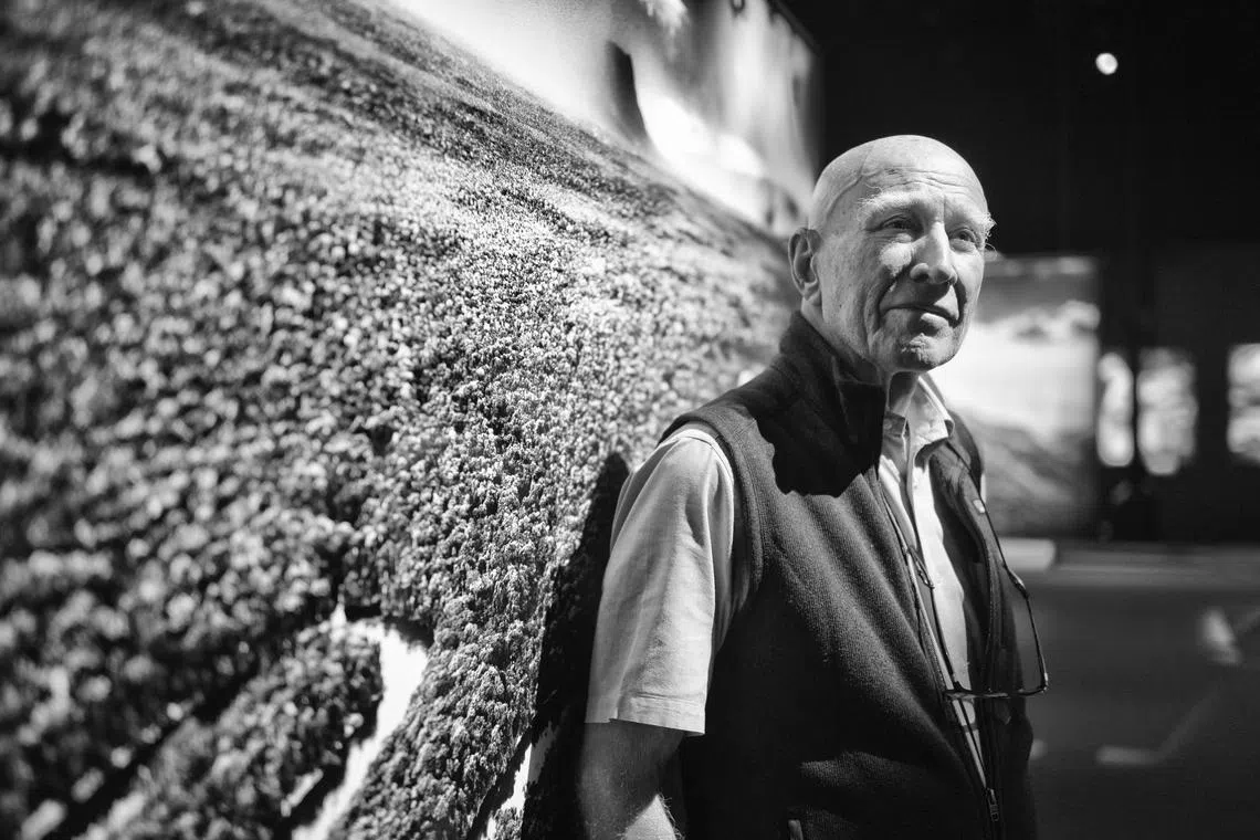 Brazilian photojournalist Sebastiao Salgado among his works on show at the exhibition, Amazonia: Photographs By Sebastiao Salgado at the National Museum of Singapore, in November 2024.