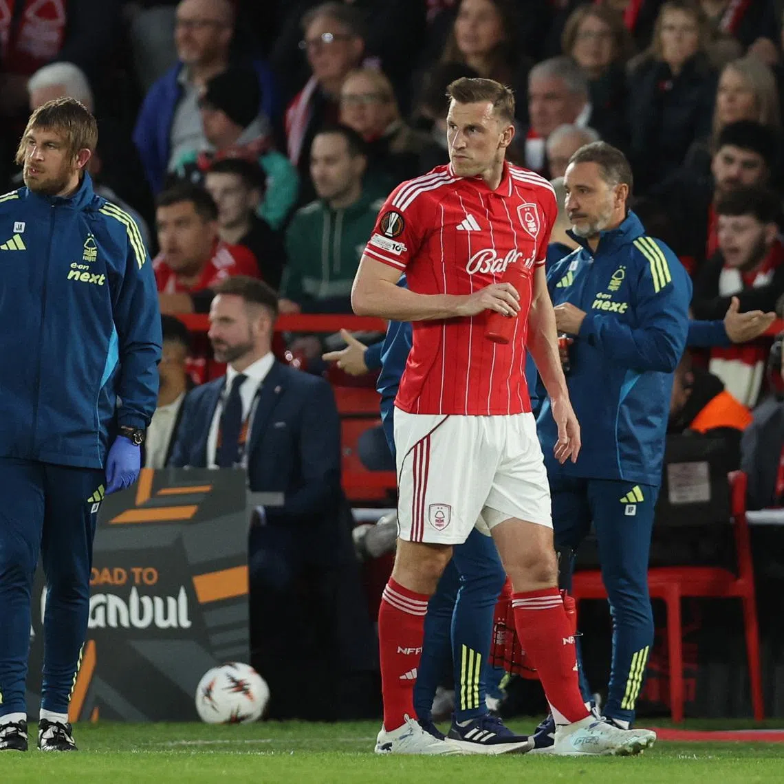 Soccer Football - UEFA Europa League - Quarter Final - Second Leg - Nottingham Forest v FC Porto - The City Ground, Nottingham, Britain - April 16, 2026 Nottingham Forest's Chris Wood after he receives medical attention after sustaining an injury REUTERS/Chris Radburn