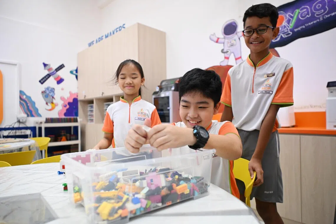 ST20251023_202583000692 Azmi Athni etspace//

(from left) Palm View Primary School students Felicity Ying, Jeriah Ang, and Eshan Firdaus using the Lego set at the makerspace on Oct 23, 2025. 

ST PHOTO: AZMI ATHNI