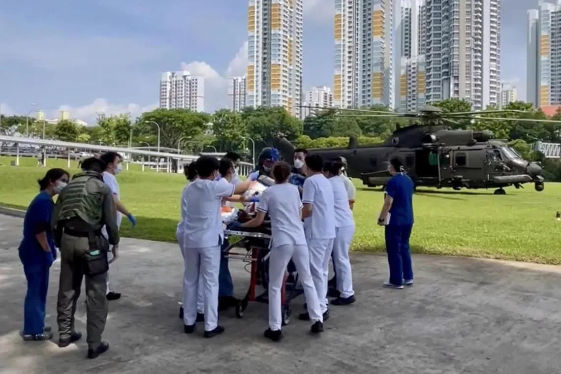 RSAF's H225M Medium Lift Helicopter arriving at the Singapore General Hospital on July 19 with the two injured crewmen.