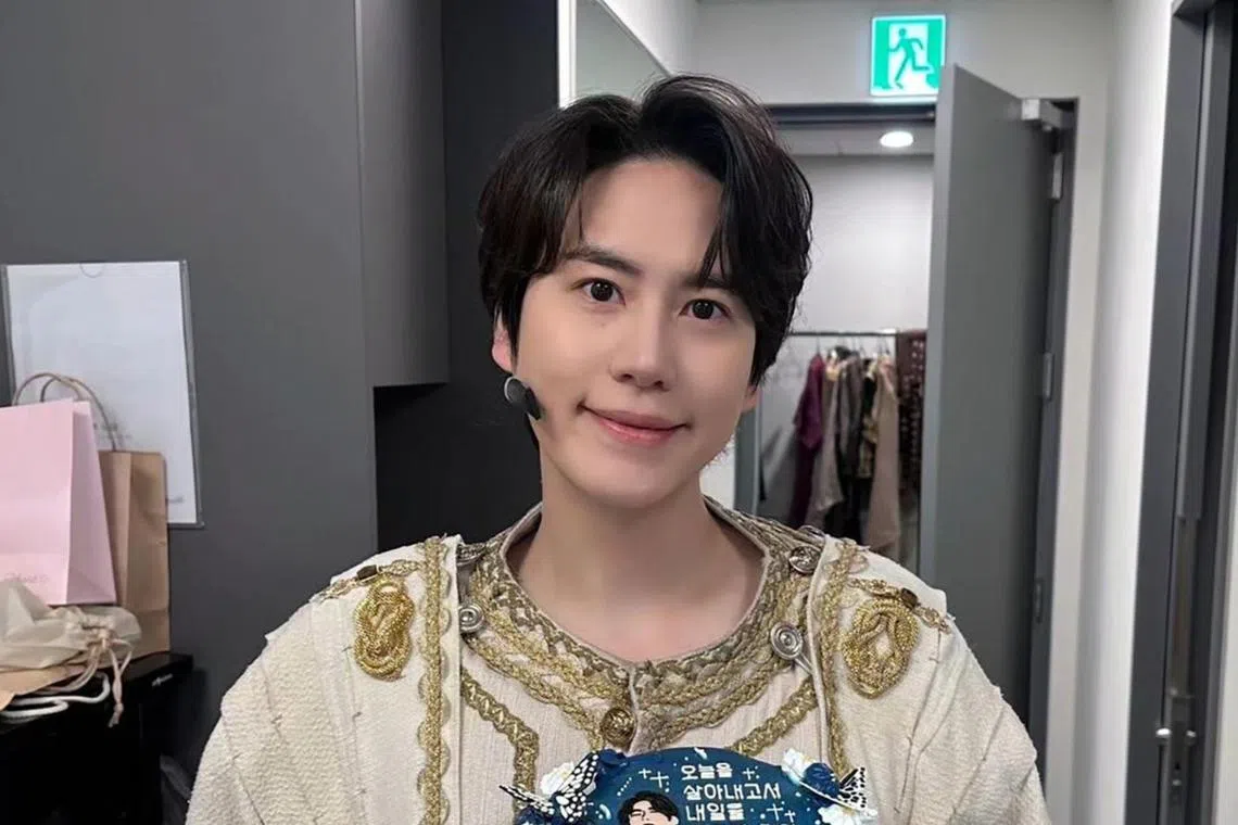 Super Junior's Kyuhyun was wounded while trying to stop a woman in her 30s wileding a knife.