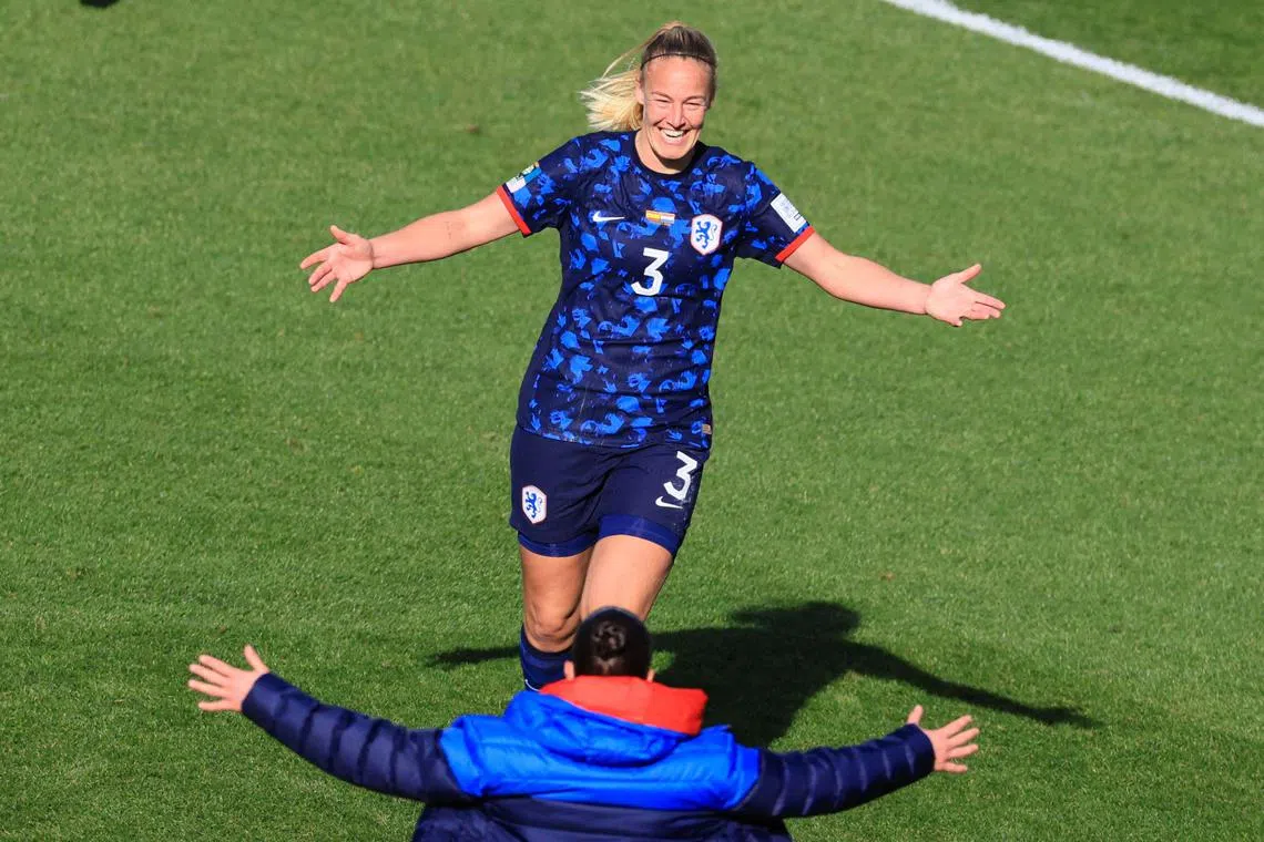 Netherlands defender Stefanie van der Gragt celebrating scoring her team's first goal against Spain in the quarterfinals of the Women's World Cup. They lost 2-1 in extra time. 