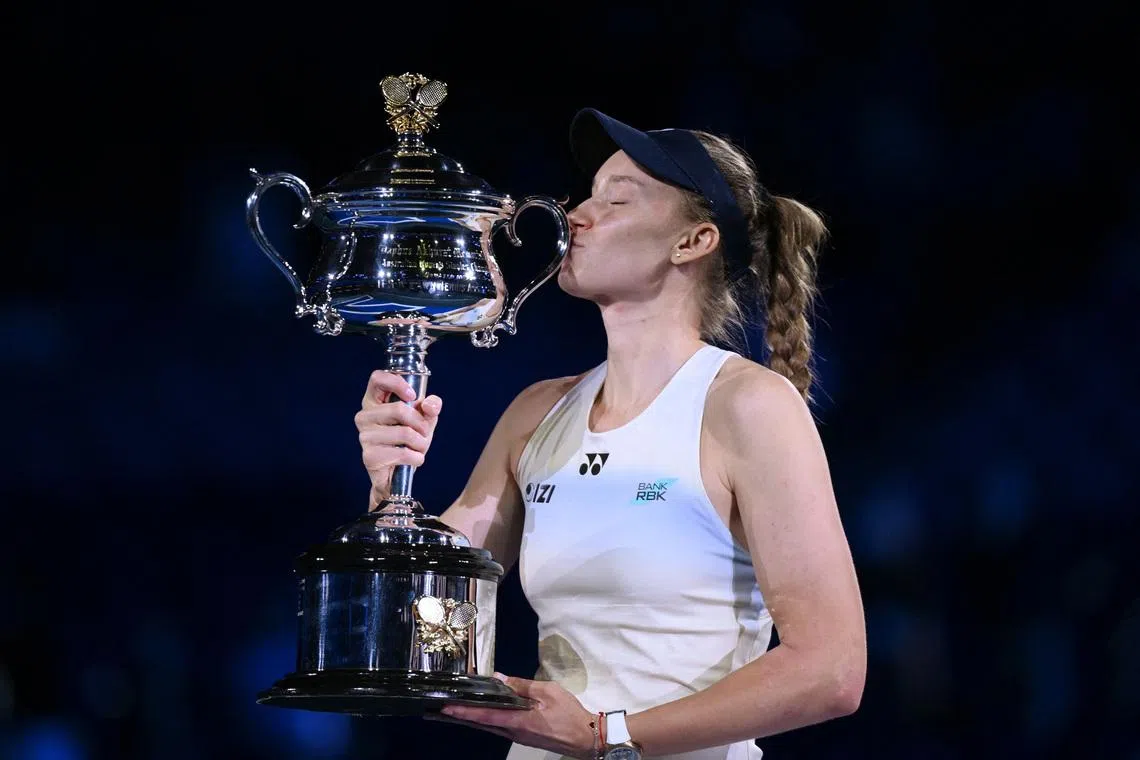 Tennis - Australian Open - Melbourne Park, Melbourne, Australia - January 31, 2026 Kazakhstan's Elena Rybakina kisses with the trophy after winning her women's singles final against Belarus' Aryna Sabalenka REUTERS/Jaimi Joy