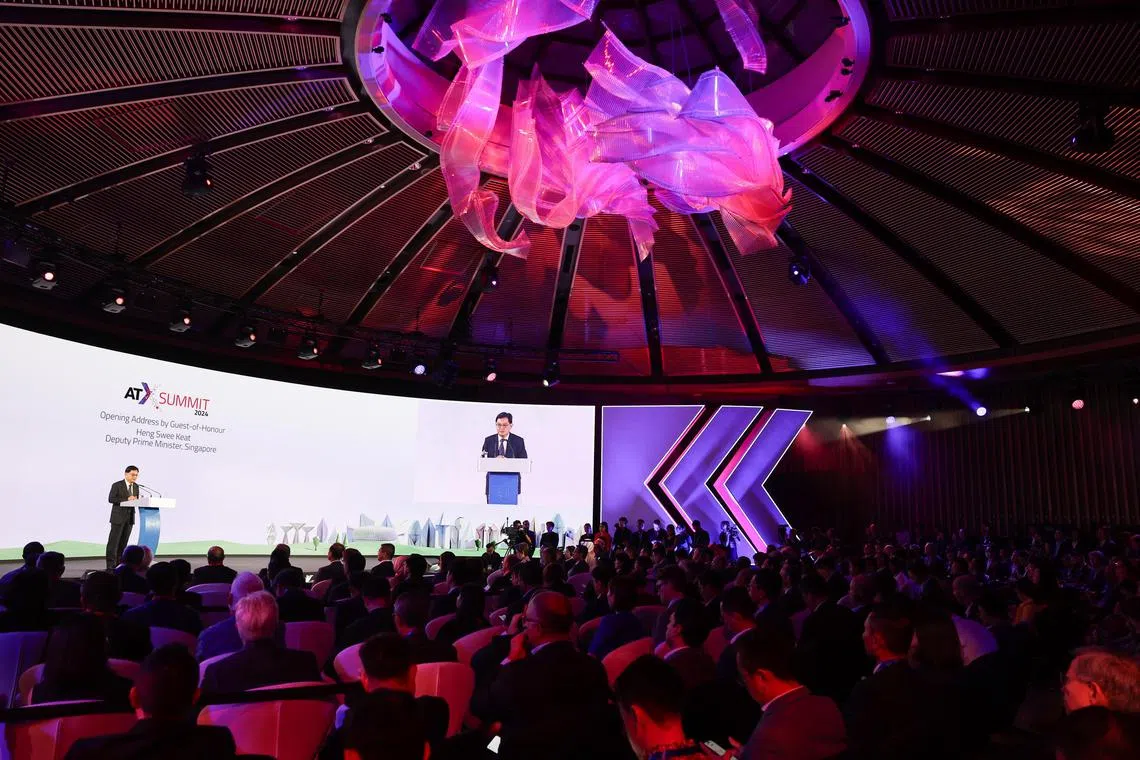 ST20240530_202486327773/Ocquantum30/Brian Teo/Osmond Chia/Deputy Prime Minister Heng Swee Keat speaking at the Asia Tech Summit (ATX) Conference at Capella Singapore on May 30, 2024. DPM Heng announced plans for the government to invest $300 million into quantum technology and elevate standards for green data centers.ST PHOTO: BRIAN TEO