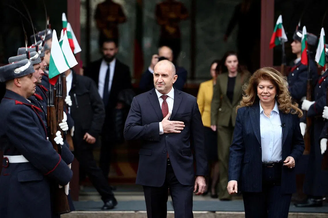 FILE PHOTO: Outgoing Bulgarian President Rumen Radev reacts next to President Iliana Iotova as he leaves the Presidency to officialy step down, in Sofia, Bulgaria, January 23, 2026. REUTERS/Stoyan Nenov/File Photo