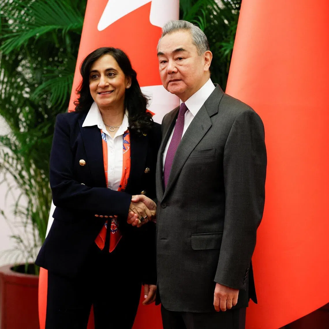 China's Foreign Minister Wang Yi (right) meets Canada's Minister of Foreign Affairs Anita Anand at the Great Hall of the People, in Beijing, China.