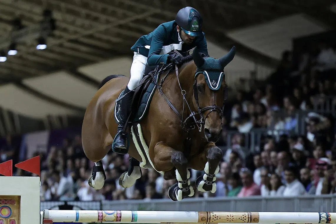 FILE PHOTO: Equestrian - FEI World Cup Finals 2024 - Riyadh International Convention and Exhibition Center, Riyadh, Saudi Arabia - April 20, 2024  Saudi Arabia's Khaled Almobty riding Jaguar King WD in action during the Longines world cup final REUTERS/Zohra Bensemra/File Photo