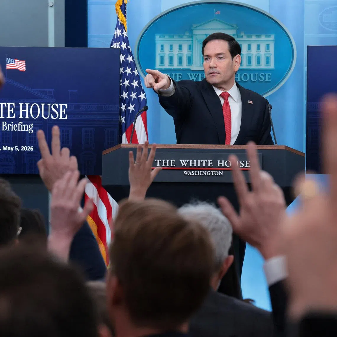 U.S. Secretary of State Marco Rubio points as members of the media raise their hands during a press briefing in the James S. Brady Press Briefing Room at the White House in Washington, D.C., U.S., May 5, 2026. REUTERS/Kylie Cooper