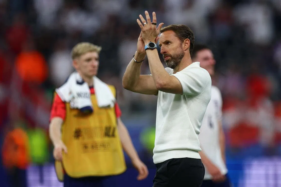 England manager Gareth Southgate applauding fans after the match against Denmark.