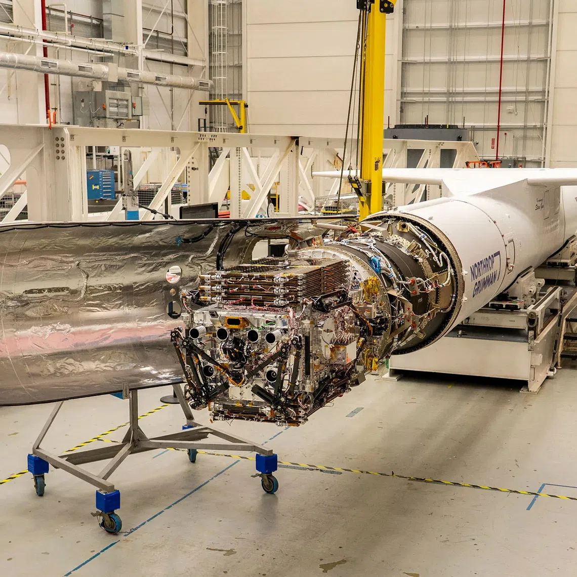 A spacecraft built by space startup Katalyst Space that will tow NASA's Neil Gehrels Swift Observatory into a higher orbit awaits encapsulation aboard a Northrop Grumman Pegasus XL at NASA's Wallops Flight Facility in Virginia, U.S. June 8, 2026. REUTERS/NASA/Ron Beard