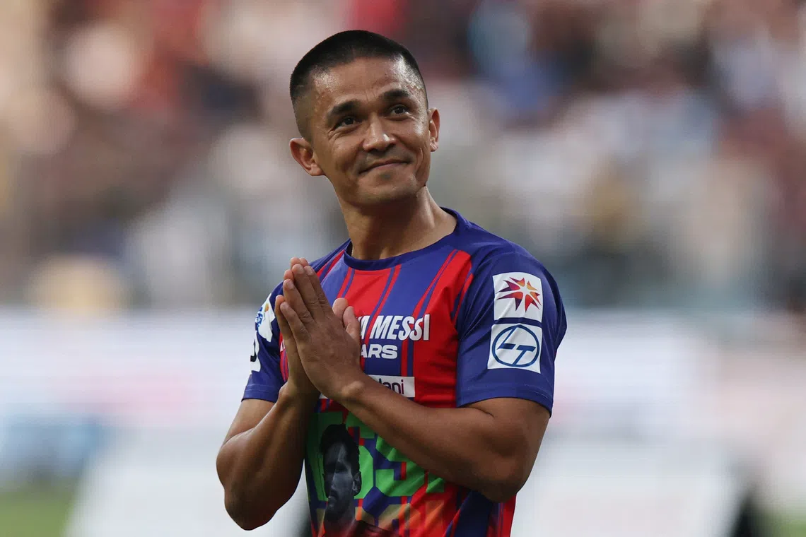Soccer Football - Lionel Messi Tour of India - Wankhede Stadium, Mumbai, India - December 14, 2025 Indian footballer Sunil Chhetri applauds fans during the tour REUTERS/Francis Mascarenhas
